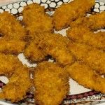 Pollo empanado con doritos.
