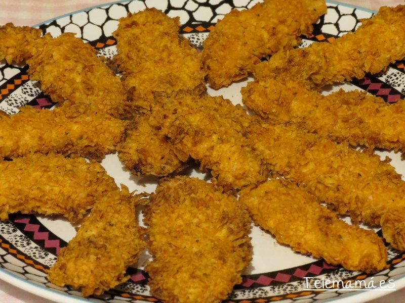 Pollo empanado con doritos.